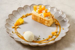 【TOOTH TOOTH BISTRO&CAFE】初夏の“きらめき果実”が登場!マンゴーのミルクレープや夏ガレットで贅沢カフェタイム
